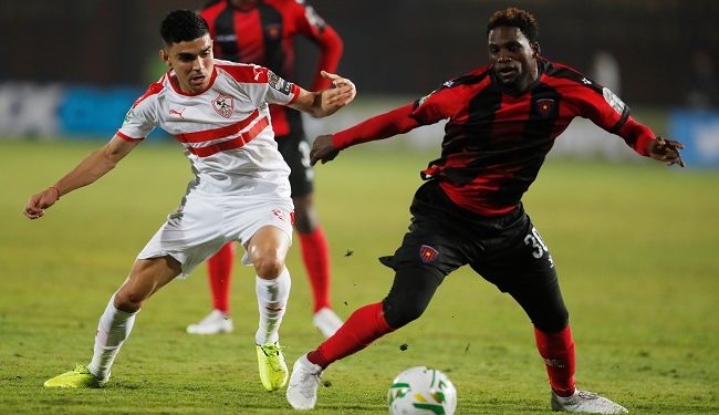Soccer Football - African Champions League - Group A - Zamalek v Primeiro de Agosto - Al Salam Stadium, Cairo, Egypt - December 7, 2019   Zamalek's Bencharki in action with Primeiro de Agosto's Ary Papel    REUTERS/Amr Abdallah Dalsh