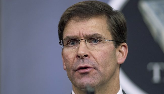 FILE - In this Aug. 28, 2019, file photo, Secretary of Defense Mark Esper speaks to reporters during a briefing at the Pentagon. Esper says the "impulsive" decision by Turkey to invade northern Syria will further destabilize a region already caught up in civil war. Esper says the invasion puts America's Syrian Kurdish partners "in harm's way," but insists the Kurds are not being abandoned. (AP Photo/Manuel Balce Ceneta, File)