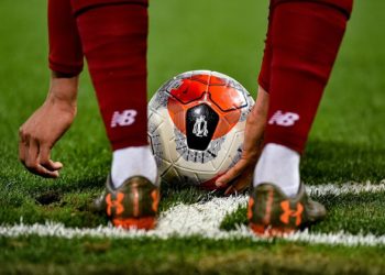 LIVERPOOL, ENGLAND - FEBRUARY 24: (THE SUN OUT, THE SUN ON SUNDAY OUT) Trent Alexander-Arnold of Liverpool placing the ball down for a corner during the Premier League match between Liverpool FC and West Ham United at Anfield on February 24, 2020 in Liverpool, United Kingdom. (Photo by Andrew Powell/Liverpool FC via Getty Images)