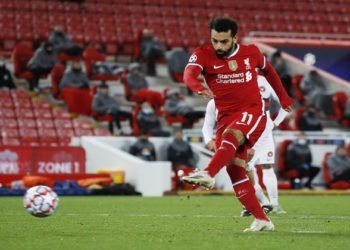 Soccer Football - Champions League - Group D - Liverpool v FC Midtjylland - Anfield, Liverpool, Britain - October 27, 2020 Liverpool's Mohamed Salah scores their second goal from the penalty spot Pool via REUTERS/Phil Noble