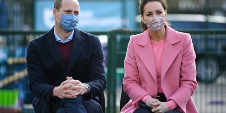 Britain's Prince William, Duke of Cambridge  and Britain's Catherine, Duchess of Cambridge listen during a discussion with teachers and mental health professionals at a visit to School21 following its re-opening after the easing of coronavirus lockdown restrictions in east London on March 11, 2021. - The visit coincides with the roll-out of Mentally Healthy Schools resources for secondary schools and how this is helping put mental health at the heart of their school?s curriculum. (Photo by JUSTIN TALLIS / various sources / AFP)/2021-03-11 21:02:20/