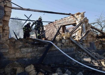 Ukrainian rescuers work outside a house destroyed following a Russian airstrike in a village in the Odessa region, on July 19, 2022, amid the Russian military invasion of Ukraine. (Photo by Oleksandr GIMANOV / AFP)