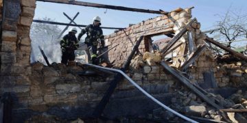 Ukrainian rescuers work outside a house destroyed following a Russian airstrike in a village in the Odessa region, on July 19, 2022, amid the Russian military invasion of Ukraine. (Photo by Oleksandr GIMANOV / AFP)